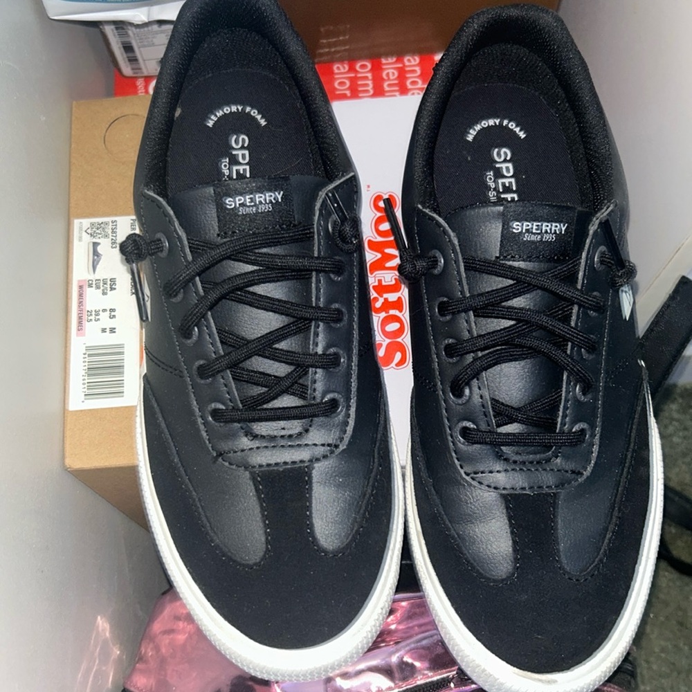 Black and white Sperry shoes